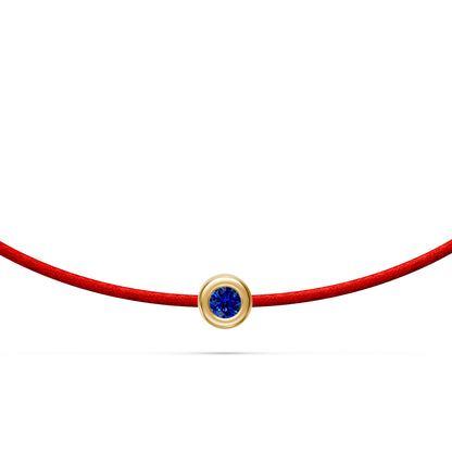 String Bracelet With Blue Sapphire in Yellow Gold