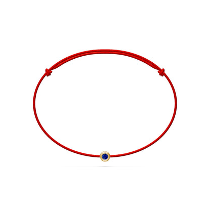 String Bracelet With Blue Sapphire in Yellow Gold