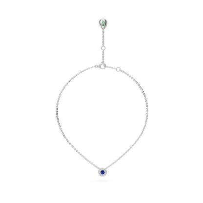 Balto aukso kaklo papuošalas su mėlynu safyru ir deimantais
